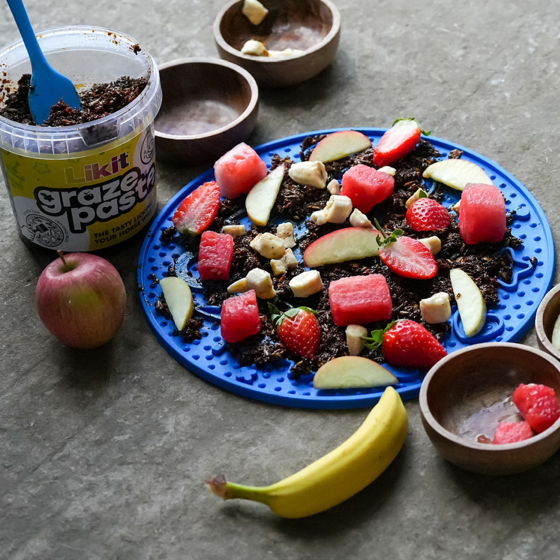 fruit salad, watermelon, banana, strawberry, yogurt?, granola?