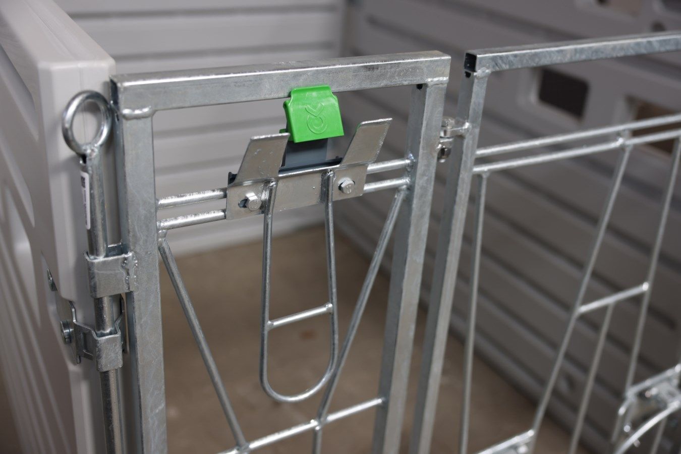 metal gate, storage cage, green latch, corrugated metal, frame lock