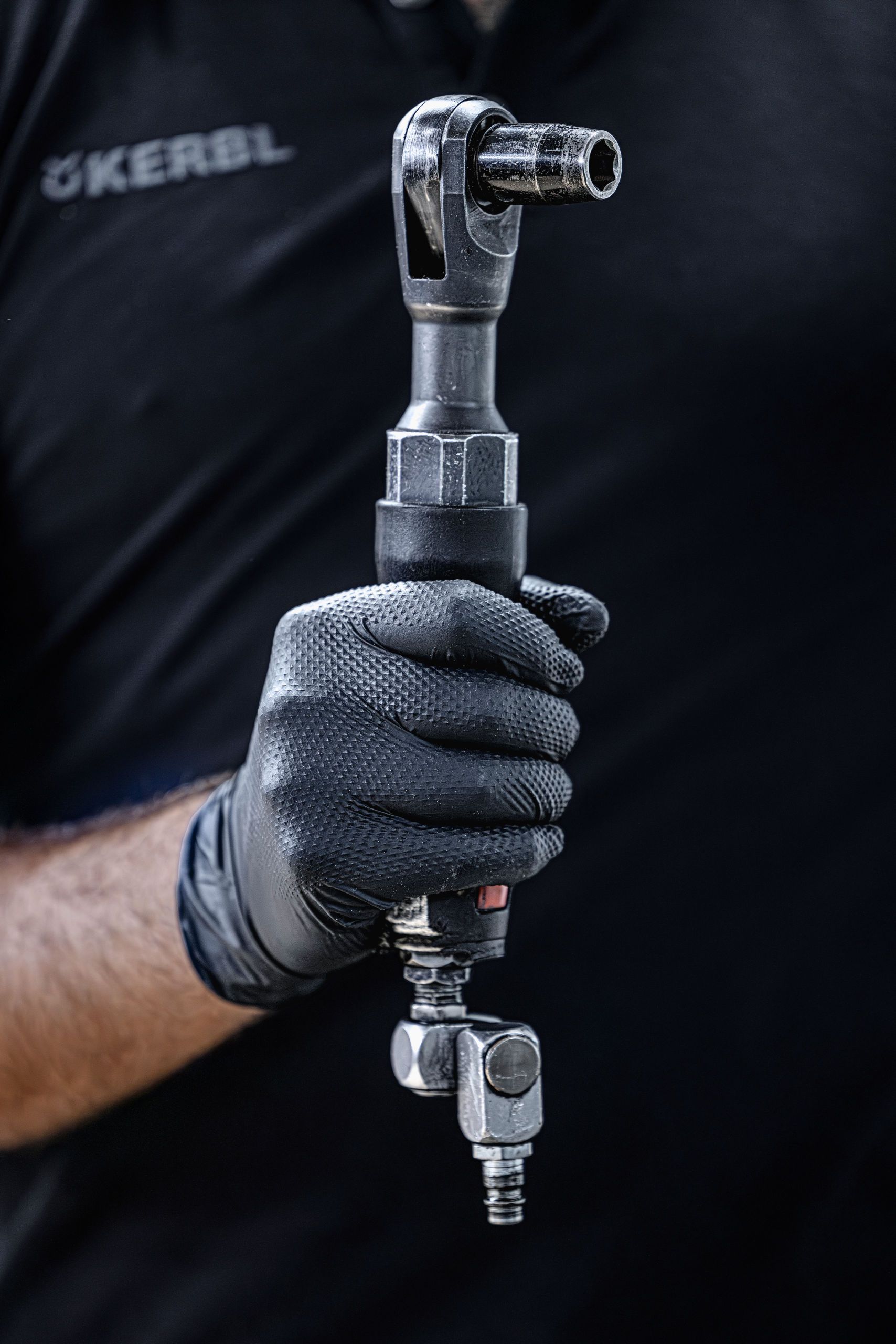 wrench, ratchet, hand tool, metallic, gloved hand