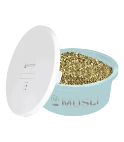 Runder Napf mit Deckel, gefuellt mit Muesli, Aufschrift Muesli, mintgruen