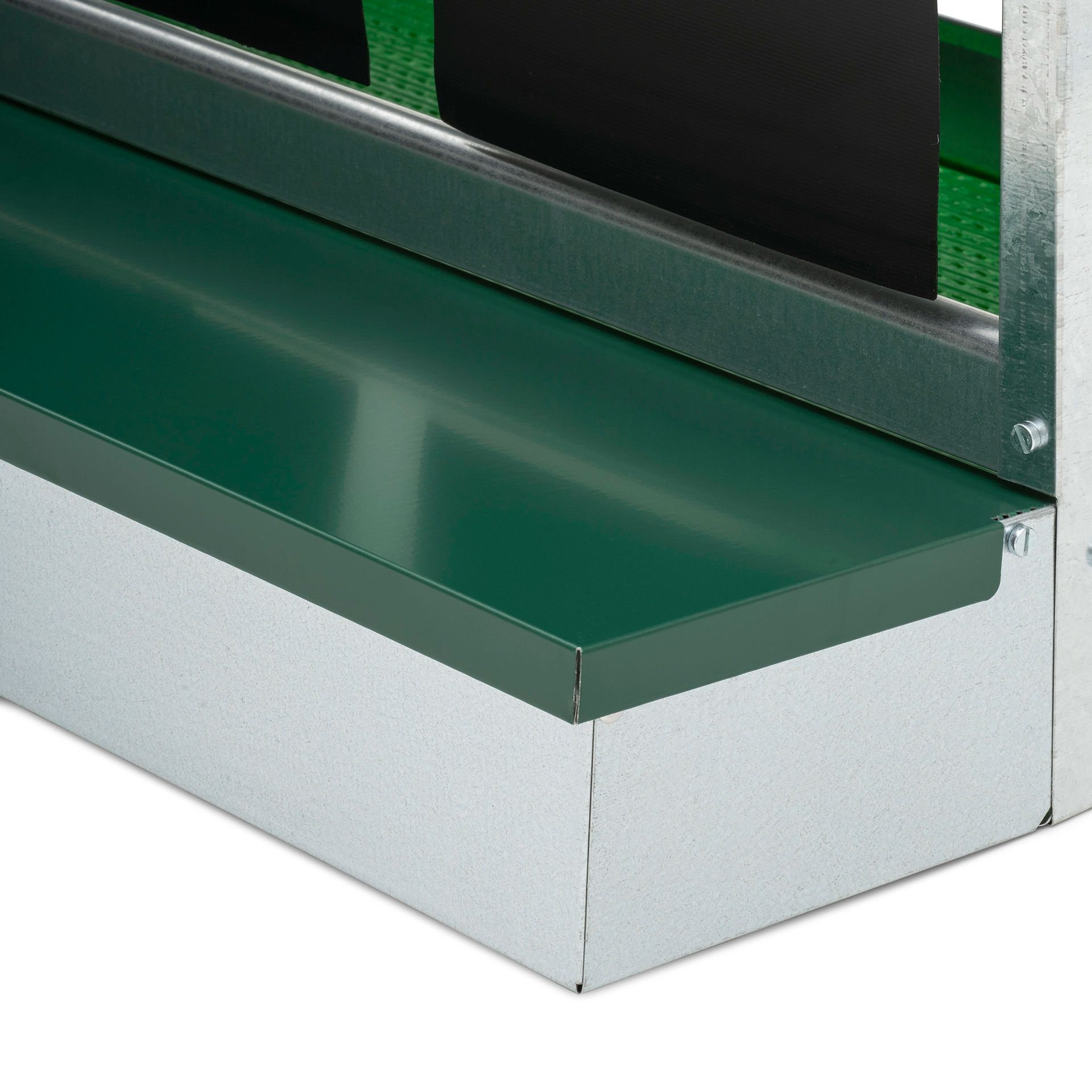 Close-up of a green metal trough on a galvanised metal stand