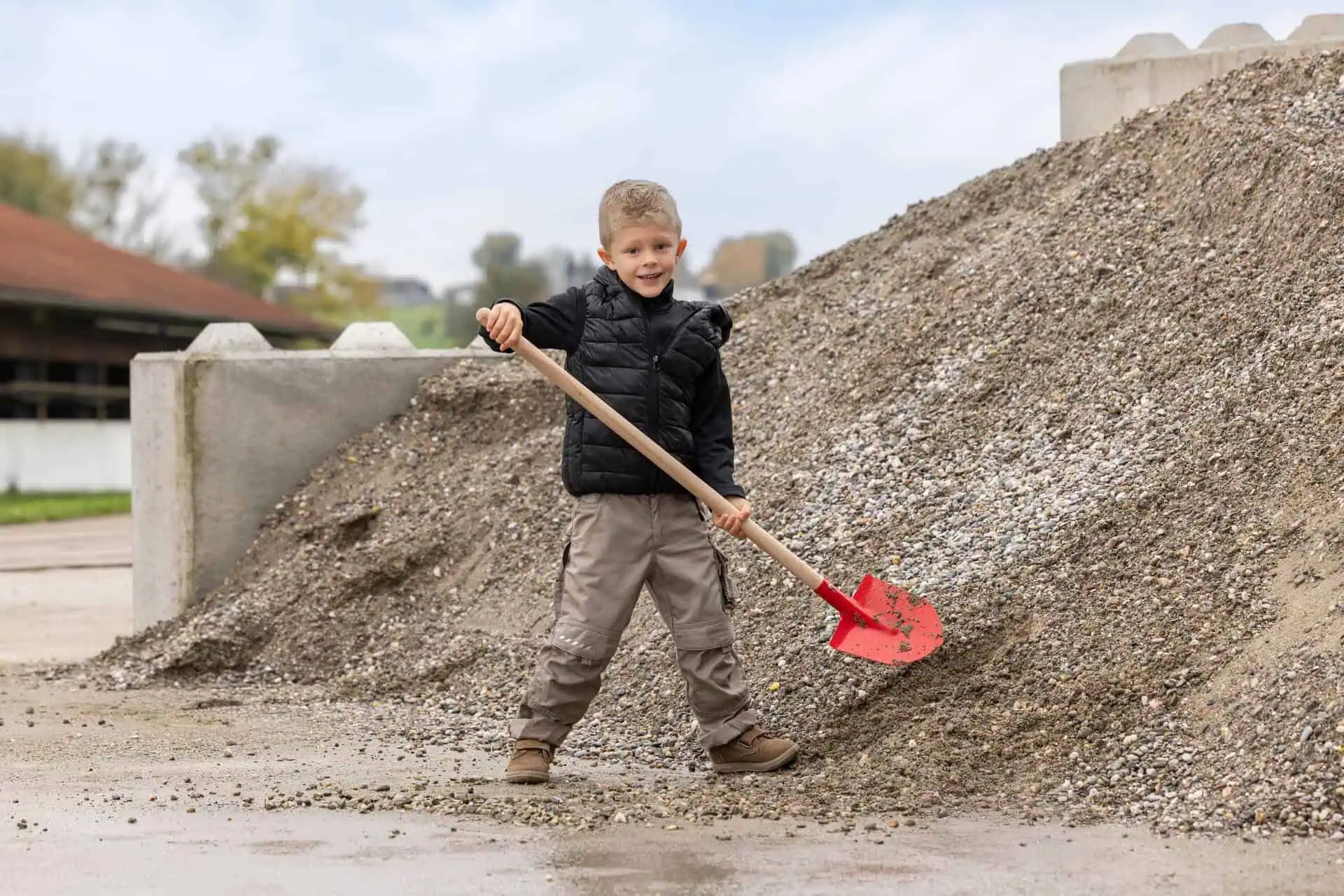 Kerbl Frankfurt Shovel Mini for Children, with Wooden Handle, in use