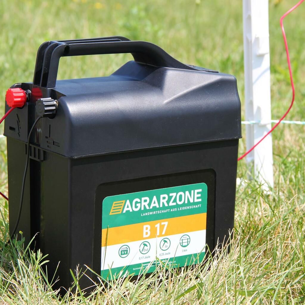 Kit clôture Agrarzone pour chien B17 à batterie 9V/12V, 0,25J, fil 250m, orange-jaune, en utilisation, au pré