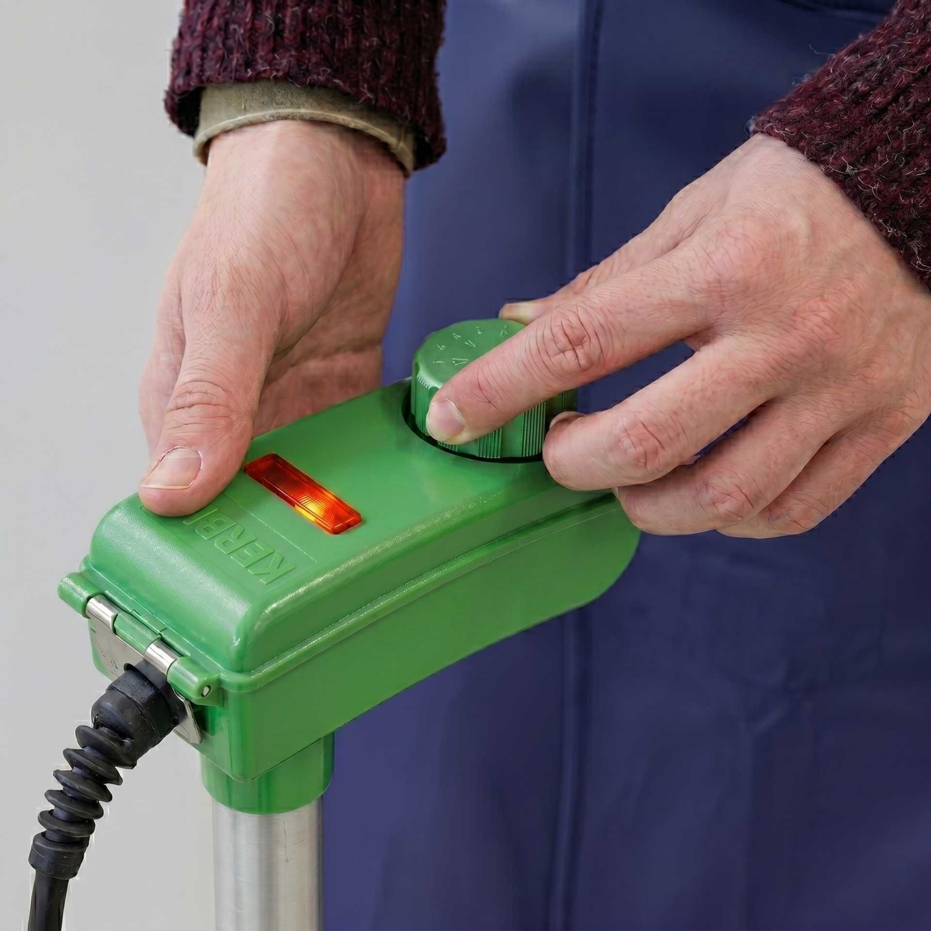 green control box, latching switch, handheld device, power cable, industrial tool