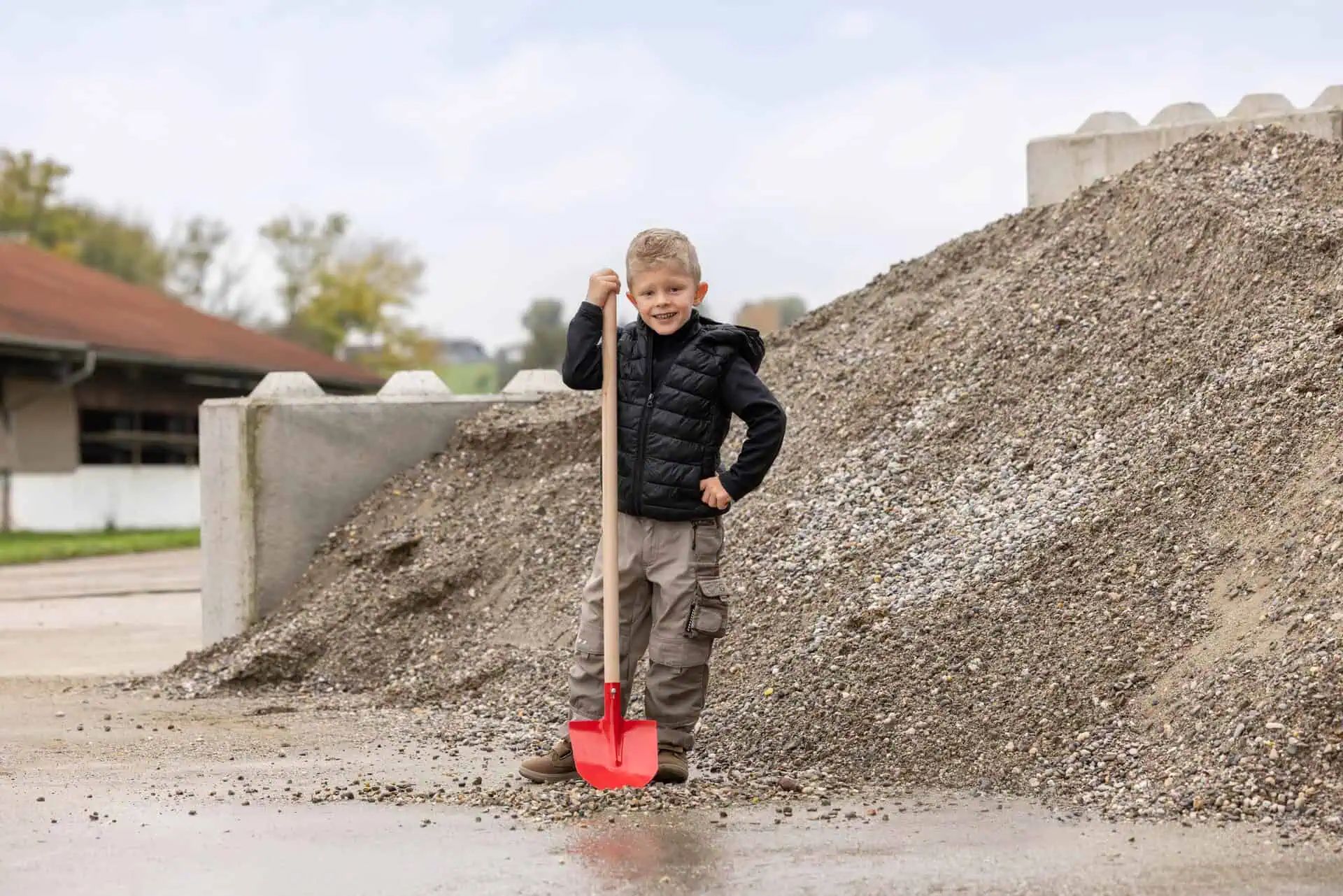 Kerbl Frankfurt Shovel Mini for Children, with Wooden Handle, in use