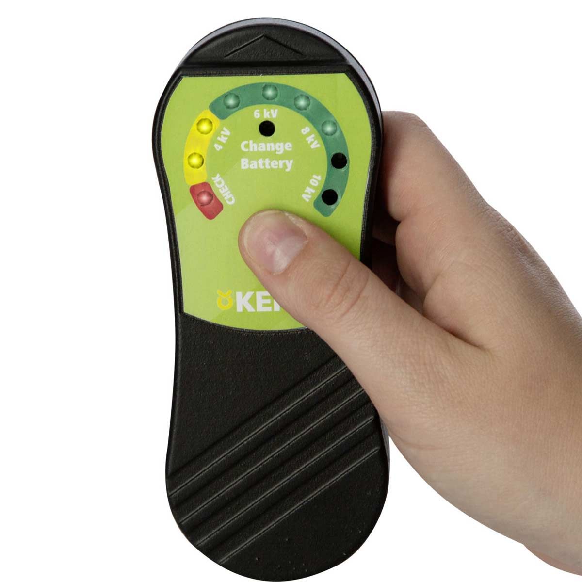 Hand holding fence voltage tester with scale and button