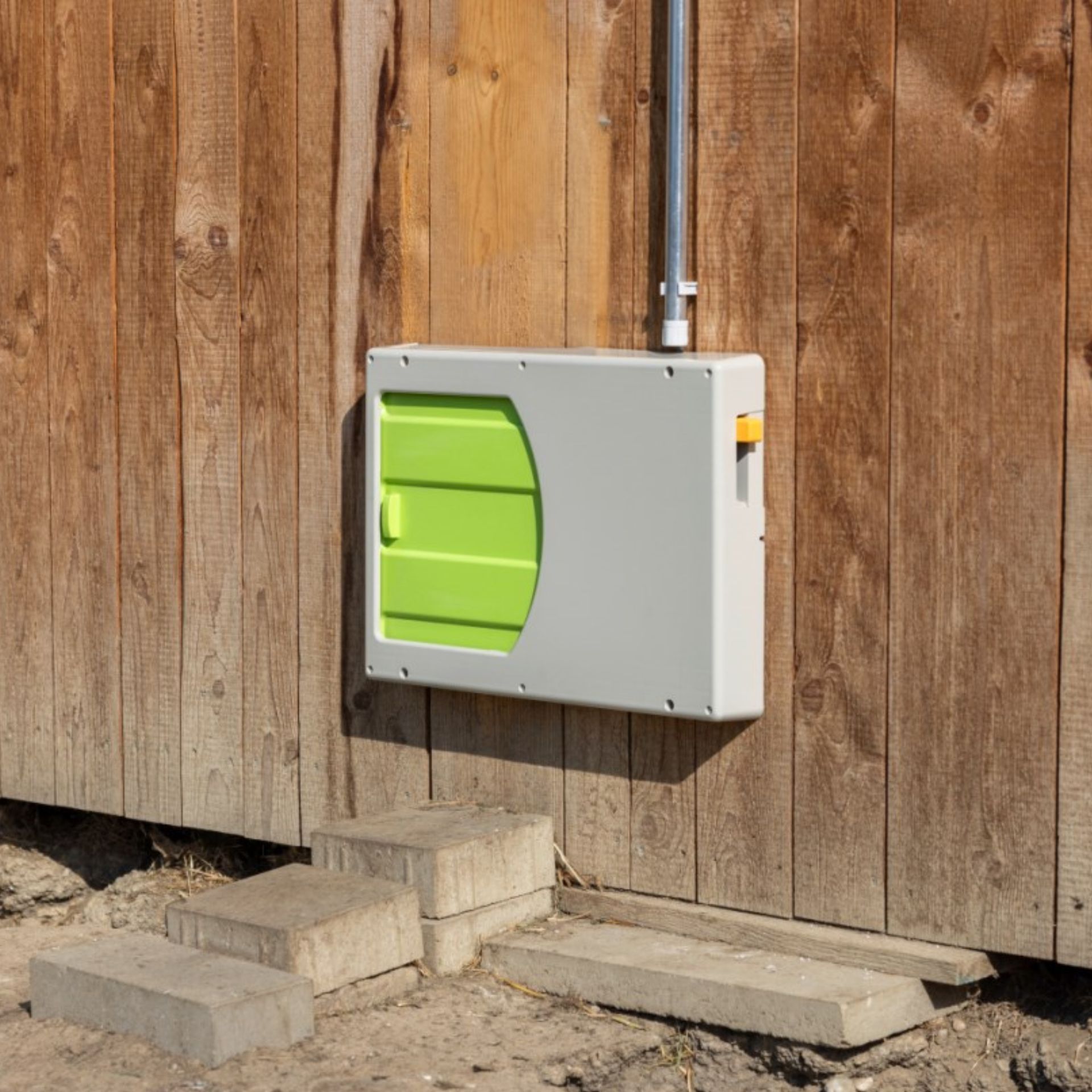 electrical box, outdoor electrical, surface-mounted box, green switch, utility enclosure