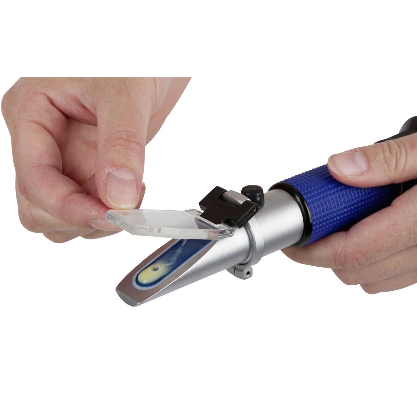 Kerbl Refractometer Colostrum Measuring Device Cow & Horse, in use, held in hand
