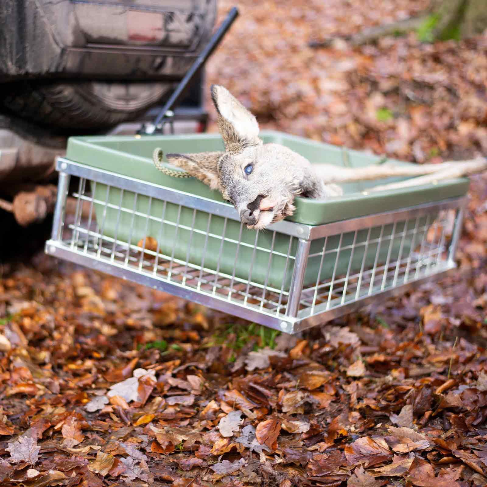 Bakre bärare med nedfällbar snabbkoppling, i användning