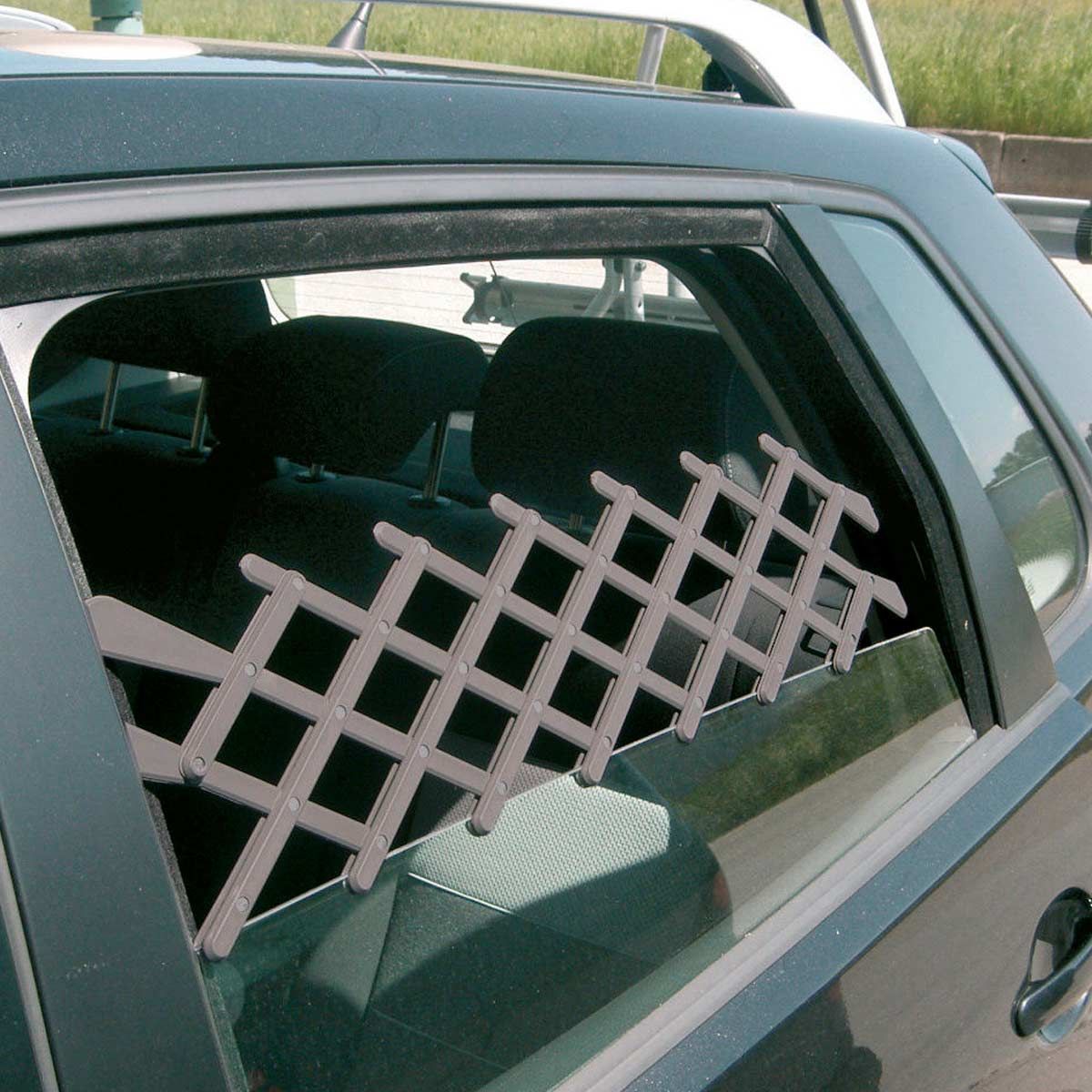 Kerbl Fresh Air Grate, Adjustable Plastic Grille for Car Windows, in use