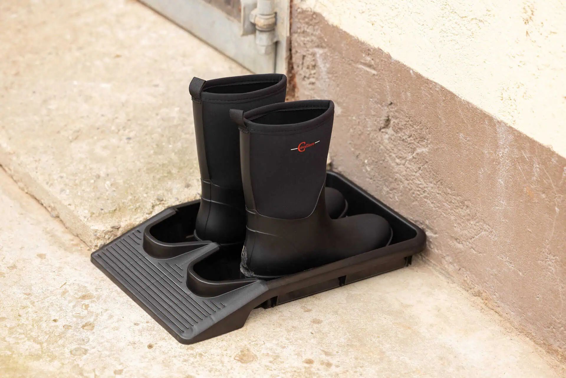 Kerbl EasyOut Boot & Shoe Removal Tray, 1 Pair, Hands-Free Use, in use