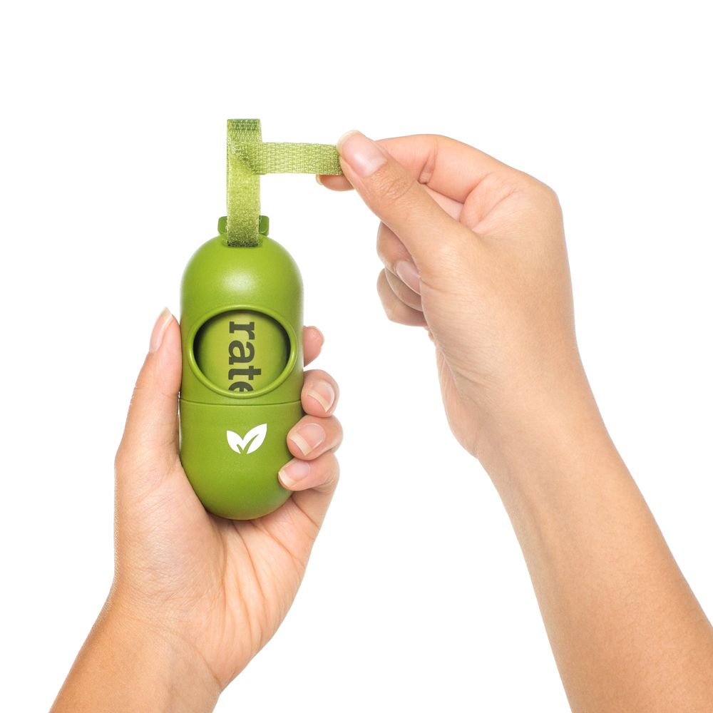 Earth Rated® Leash Dispenser with Unscented Bags, in use, held in hand
