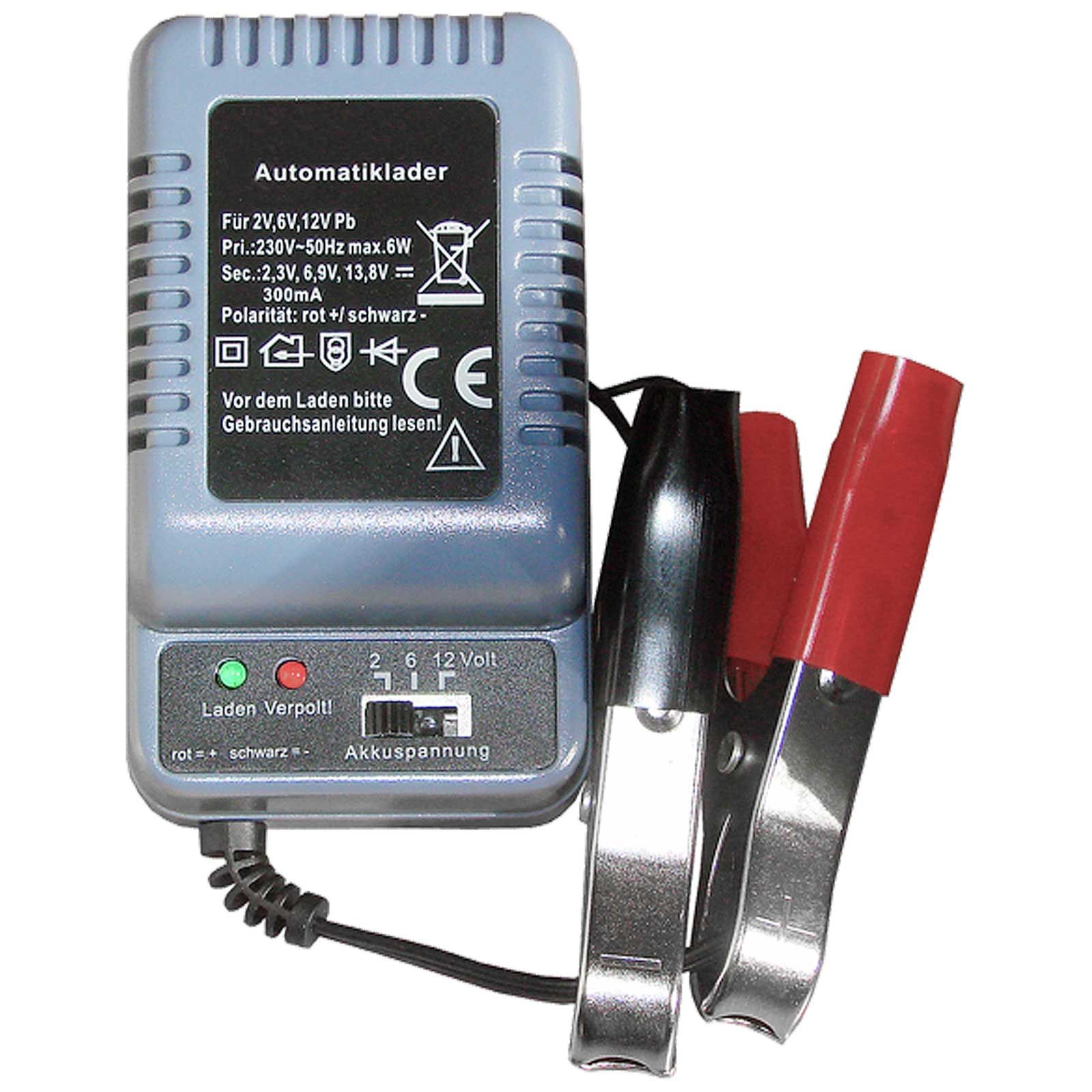 graues Batterieladegeraet mit roter und schwarzer Klemme sowie Anzeigelampen
